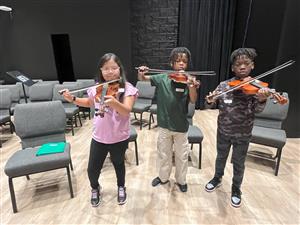 three young violinist